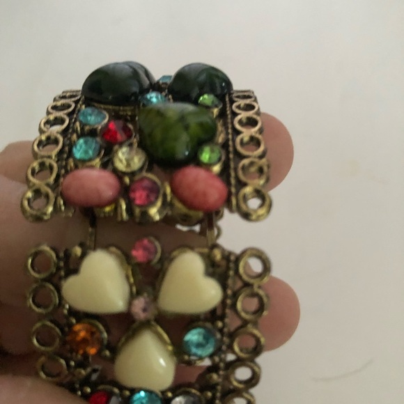 Colorful boho style rhinestones and colourful stones embedded in a gold metal. - Picture 3 of 12